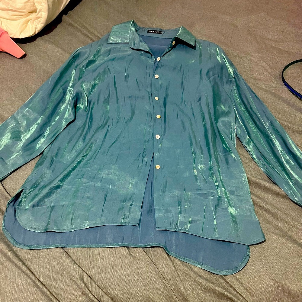metallic turquoise long sleeve button down shirt.